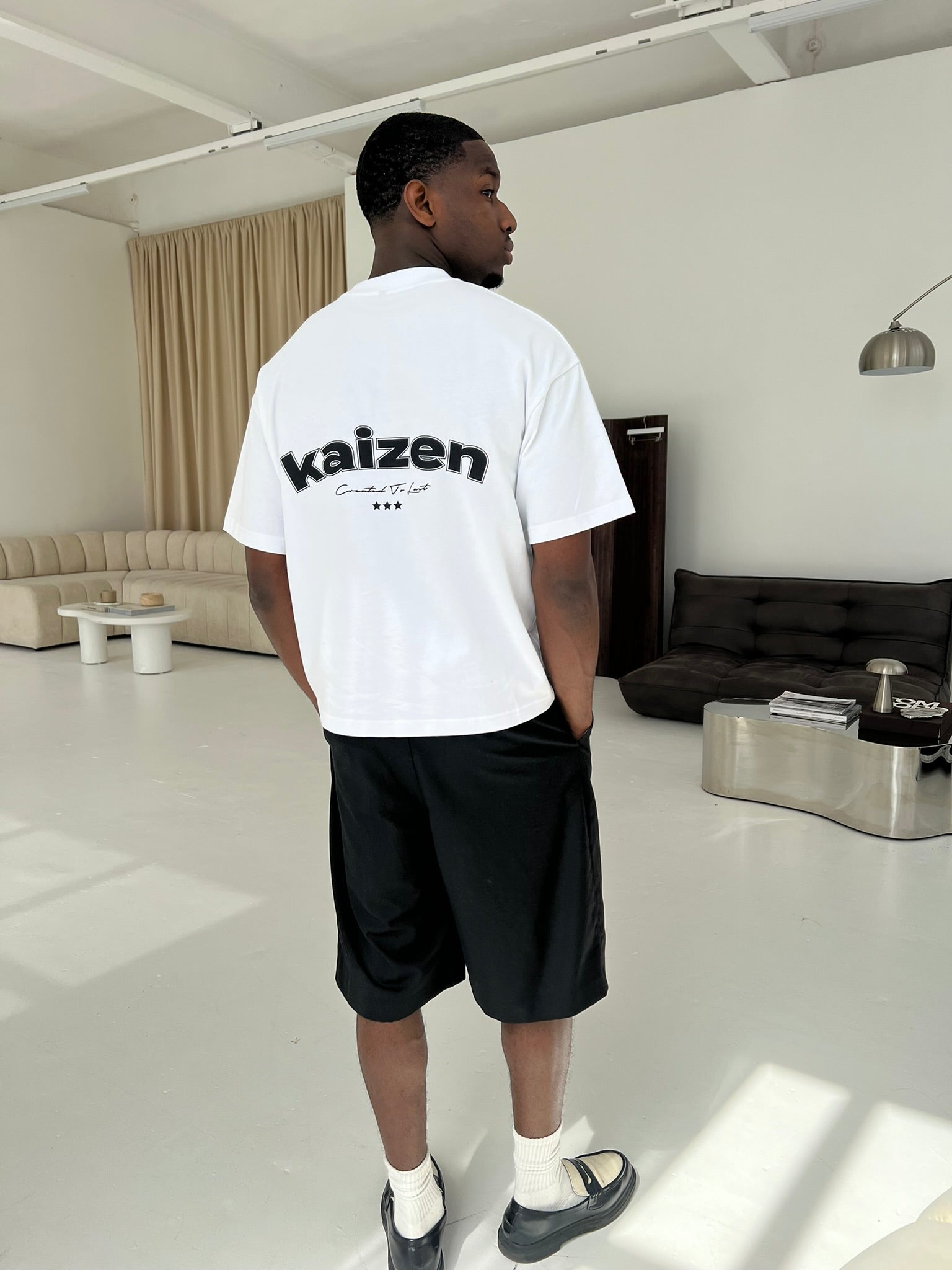 Model view of Kaizen Market Arch White T-shirts